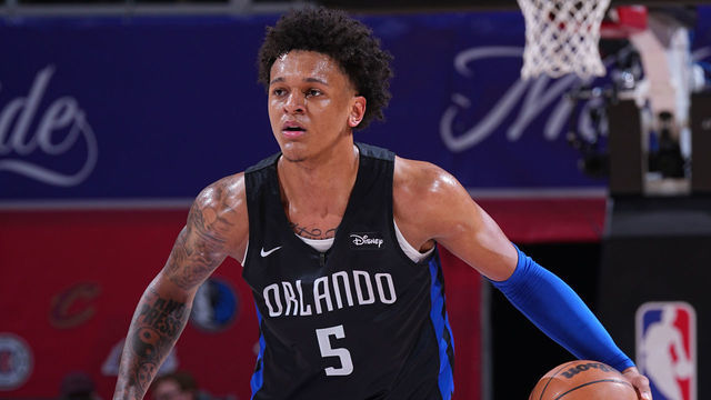 Las Vegas, NV - JULY 9: Paolo Banchero #5 of the Orlando Magic dribbles the ball against the Sacramento Kings during the 2022 Las Vegas Summer League on July 9, 2022 at the Thomas & Mack Center in Las Vegas, Nevada. NOTE TO USER: User expressly acknowledges and agrees that, by downloading and/or using this Photograph, user is consenting to the terms and conditions of the Getty Images License Agreement. Mandatory Copyright Notice: Copyright 2022 NBAE