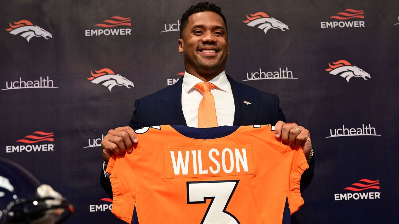 ENGLEWOOD, CO - MARCH 16: Quarterback Russell Wilson is introduced by head coach Nathaniel Hackett and GM George Paton at Denver Broncos Headquarters in Englewood, Colorado on Wednesday, March 16, 2022.