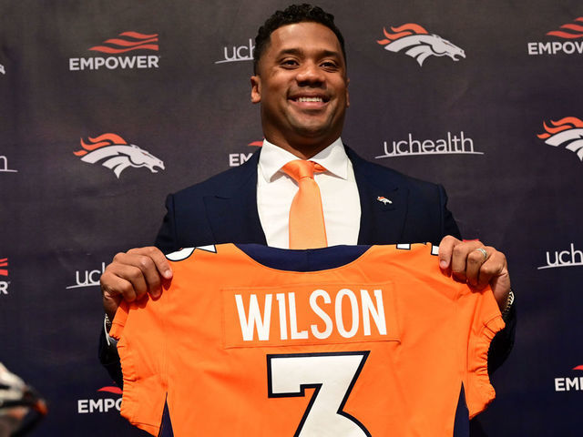 ENGLEWOOD, CO - MARCH 16: Quarterback Russell Wilson is introduced by head coach Nathaniel Hackett and GM George Paton at Denver Broncos Headquarters in Englewood, Colorado on Wednesday, March 16, 2022.