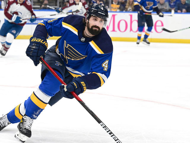 ST. LOUIS, MO - MAY 23: St. Louis Blues defenseman Nick Leddy (4) controls the puck in the second period during Round 2 Game 4 of the NHL Stanley Cup Playoffs between the Colorado Avalanche and the St. Louis Blues on May 23, 2022, at Enterprise Center, St. Louis, MO. ,