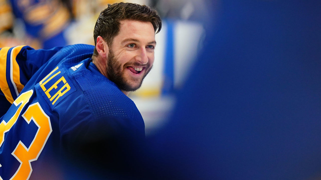 BUFFALO, NY - MARCH 23: Colin Miller #33 of the Buffalo Sabres smiles during warmups prior to an NHL game against the Pittsburgh Penguins on March 23, 2022 at KeyBank Center in Buffalo, New York.