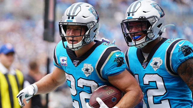 CHARLOTTE, NORTH CAROLINA - OCTOBER 06: Christian McCaffrey #22 of the Carolina Panthers and D.J. Moore #12 of the Carolina Panthers during the first half of their game against the Jacksonville Jaguars at Bank of America Stadium on October 06, 2019 in Charlotte, North Carolina.
