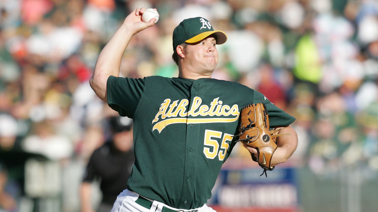 Oakland Athletics Nick Swisher getting hair cut by father Steve News  Photo - Getty Images