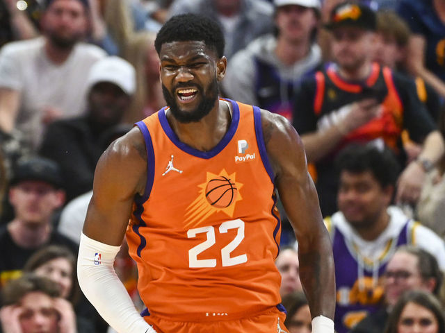 SALT LAKE CITY, UTAH - APRIL 08: Deandre Ayton #22 of the Phoenix Suns celebrates a basket during the second half of a game against the Utah Jazz at Vivint Smart Home Arena on April 08, 2022 in Salt Lake City, Utah.