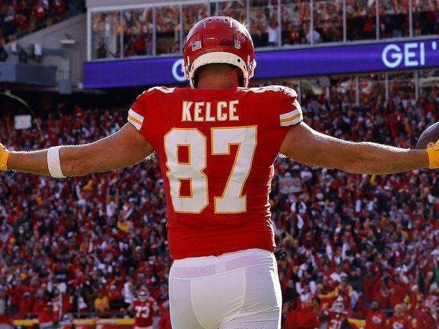 KANSAS CITY, MISSOURI - JANUARY 30: (EDITOR'S NOTE: Alternate crop) Tight end Travis Kelce #87 of the Kansas City Chiefs celebrates with quarterback Patrick Mahomes #15 after catching a second quarter touchdown pass against the Cincinnati Bengals in the AFC Championship Game at Arrowhead Stadium on January 30, 2022 in Kansas City, Missouri.
