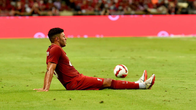 SINGAPORE, SINGAPORE - JULY 15: ( THE SUN OUT,THE SUN ON SUNDAY OUT ) Alex Oxlade-Chamberlain of Liverpoool goes down in action jured during the preseason friendly between Liverpool v Crystal Palace at National Stadium on July 15, 2022 in Singapore.