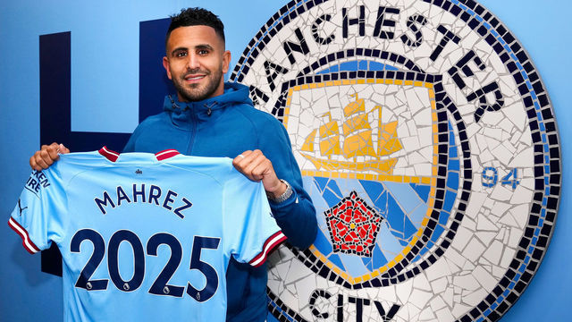 MANCHESTER, ENGLAND - JULY 15: Riyad Mahrez of Manchester City signs a contract extension at Manchester City Academy Stadium on July 15, 2022 in Manchester, England.