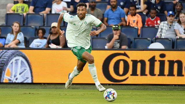 KANSAS CITY, KS - MAY 18: Auston Trusty #5 of Colorado Rapids with the ball during a game between Colorado Rapids and Sporting Kansas City at Children's Mercy Park on May 18, 2022 in Kansas City, Kansas.
