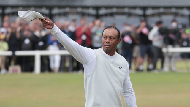 ST ANDREWS, SCOTLAND - JULY 15: Tiger Woods waves to the crowd during Day Two of The 150th Open at St Andrews Old Course on July 15, 2022 in St Andrews, United Kingdom.