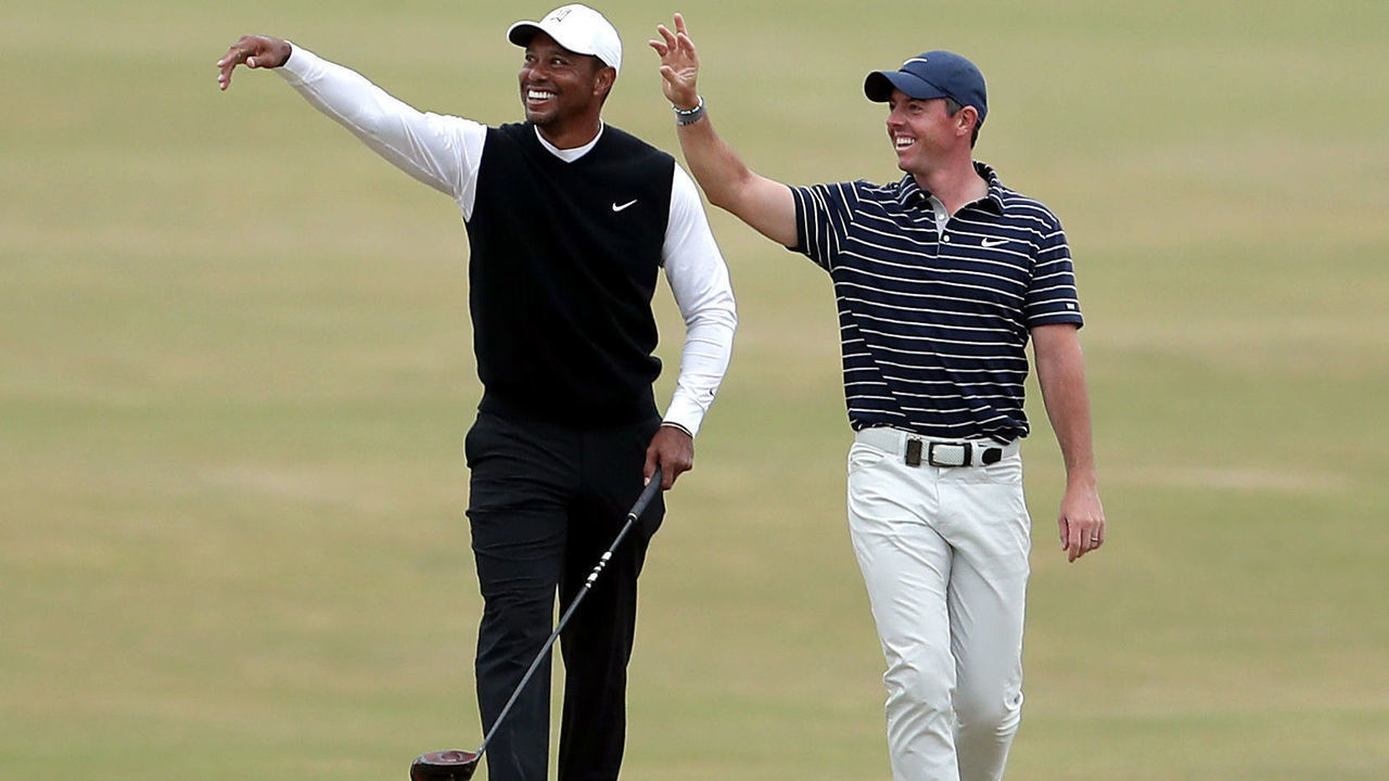 Tiger Woods (left) and Rory McIlroy of Team Woods on the 18th fairway during the R&A Celebration of Champions event at the Old Course, St Andrews. Picture date: Monday July 11, 2022.