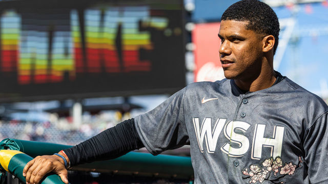 WASHINGTON, DC - APRIL 10: Juan Soto #22 of the Washington Nationals looks on from the dugout during the game between the New York Mets and the Washington Nationals at Nationals Park on Sunday, April 10, 2022 in Washington, District of Columbia.