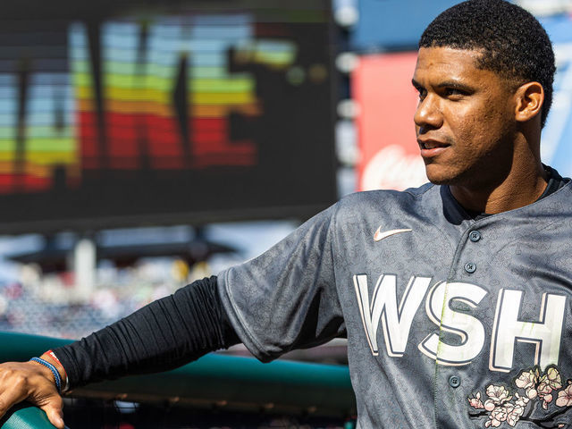 WASHINGTON, DC - APRIL 10: Juan Soto #22 of the Washington Nationals looks on from the dugout during the game between the New York Mets and the Washington Nationals at Nationals Park on Sunday, April 10, 2022 in Washington, District of Columbia.