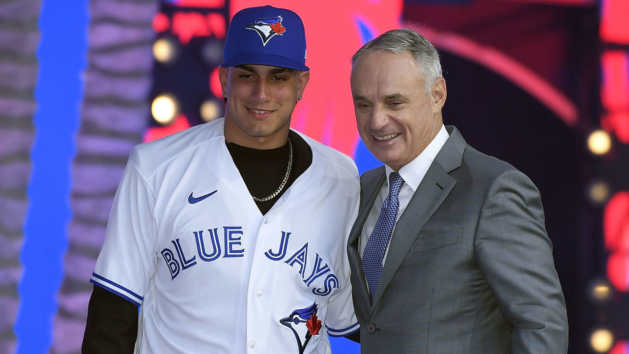 LOS ANGELES, CA - JULY 17: Brandon Barriera poses with Robert Manfred, commissioner of Major League Baseball, after he was picked 23th in the first round by the Toronto Blue Jays during the 2022 MLB Draft at XBOX Plaza on July 17, 2022 in Los Angeles, California.
