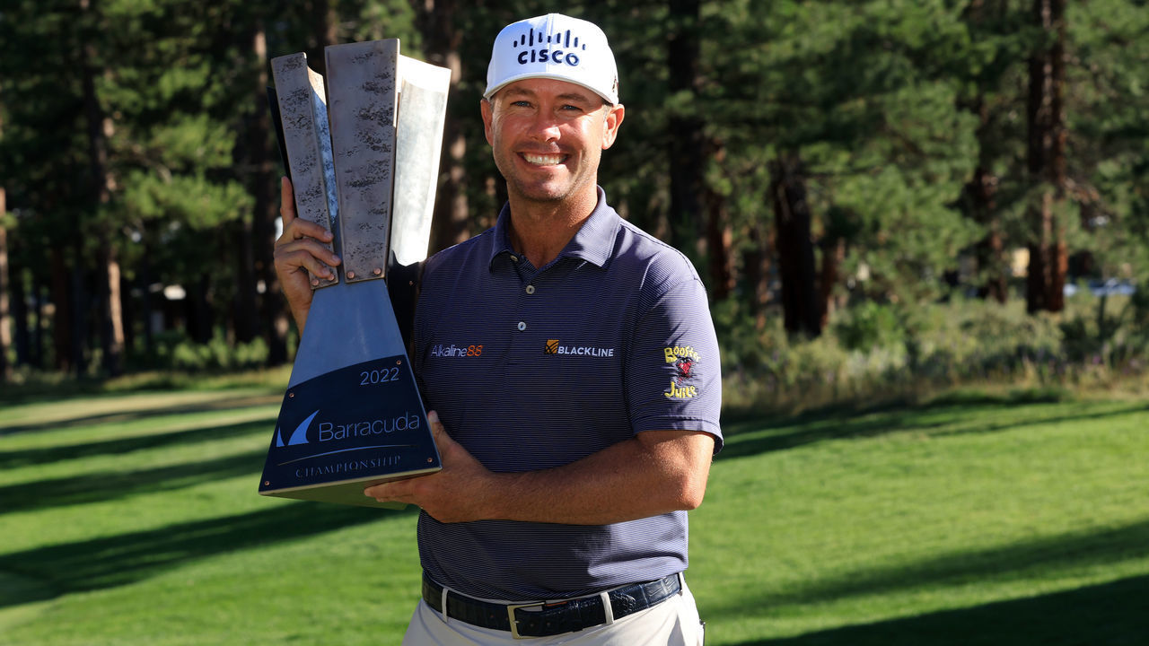 TRUCKEE, CALIFORNIA - JULY 17: Chez Reavie of the United States poses with the trophy after putting in to win on the 18th green during the final round of the Barracuda Championship at Tahoe Mountain Club on July 17, 2022 in Truckee, California.