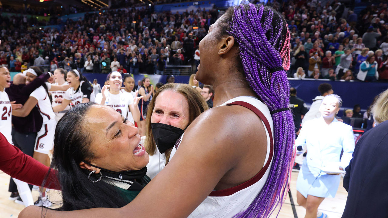MINNEAPOLIS, MN - APRIL 03: Head coach Dawn Staley and Aliyah Boston #4 of the South Carolina Gamecocks celebrate their win over the Connecticut Huskies during the championship game of the NCAA Womens Basketball Tournament at Target Center on April 3, 2022 in Minneapolis, Minnesota.