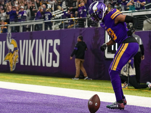 MINNEAPOLIS, MN - DECEMBER 09: Minnesota Vikings Wide Receiver Justin Jefferson (18) celebrates his 14-yard touchdown reception from Minnesota Vikings Quarterback Kirk Cousins (8) during first quarter of a game between the Minnesota Vikings and Pittsburgh Steelers on December 9, 2021, at U.S. Bank Stadium in Minneapolis, MN.