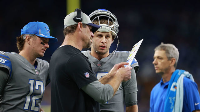 DETROIT, MICHIGAN - DECEMBER 05: Head coach Dan Campbell of the Detroit Lions talks with Jared Goff #16 of the Detroit Lions during a timeout during the first half against the Minnesota Vikings at Ford Field on December 05, 2021 in Detroit, Michigan.