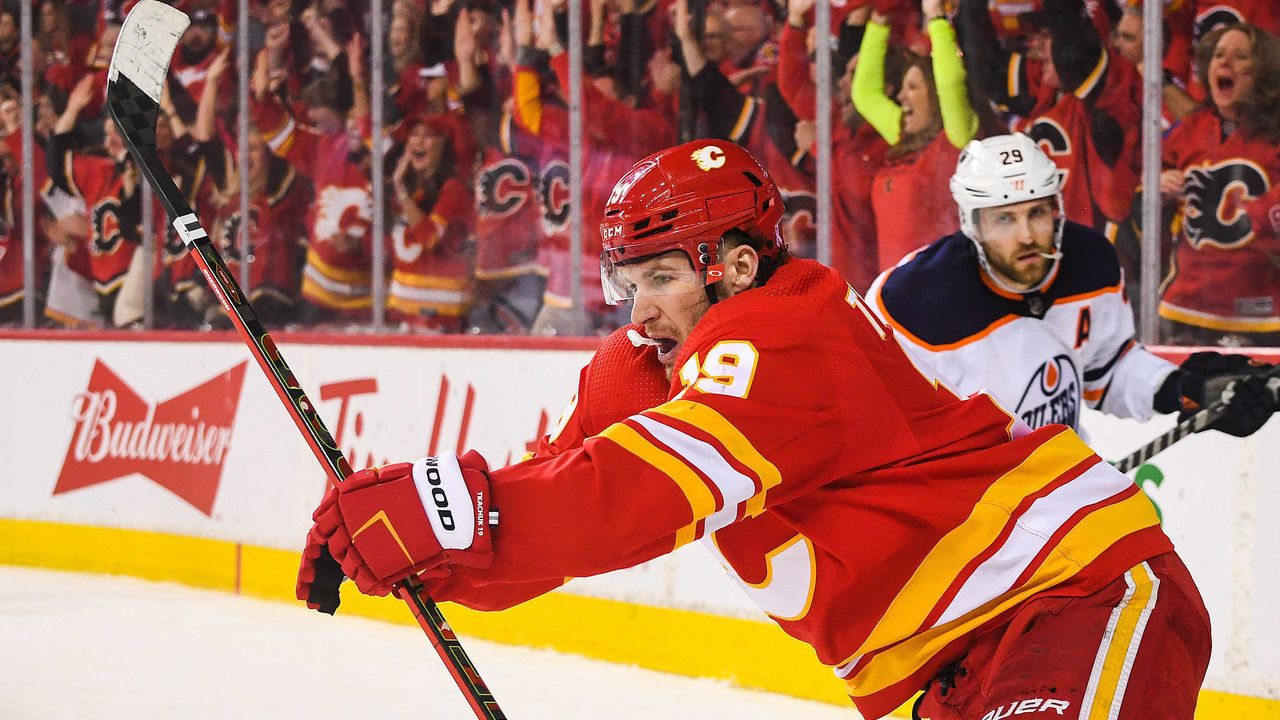 CALGARY, AB - MAY 18: Matthew Tkachuk #19 of the Calgary Flames celebrates after scoring against the Edmonton Oilers during the third period of Game One of the Second Round of the 2022 Stanley Cup Playoffs at Scotiabank Saddledome on May 18, 2022 in Calgary, Alberta, Canada.