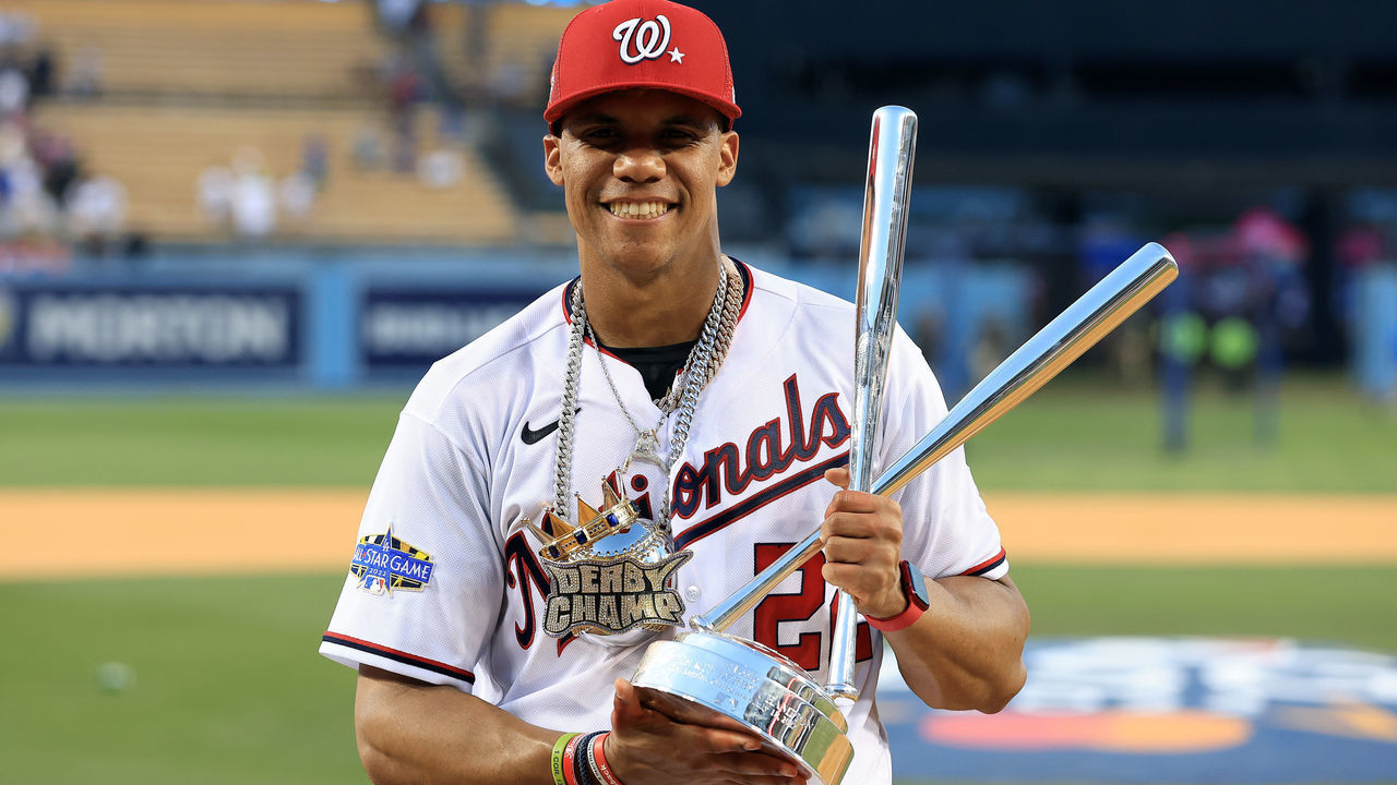 LOS ANGELES, CALIFORNIA - JULY 18: National League All-Star Juan Soto #22 of the Washington Nationals poses with the 2022 T-Mobile Home Run Derby trophy after winning the event at Dodger Stadium on July 18, 2022 in Los Angeles, California.