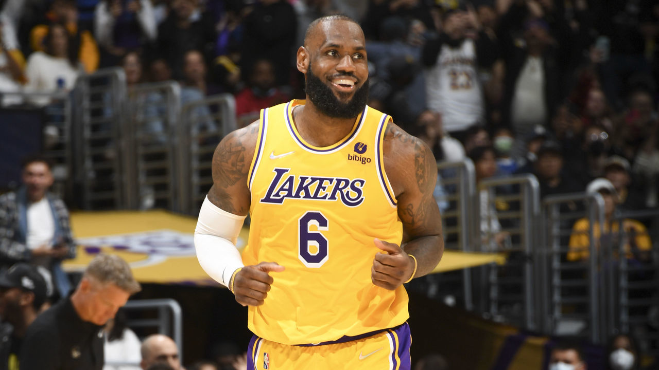 LOS ANGELES, CA - MARCH 5: LeBron James #6 of the Los Angeles Lakers reacts to his three point basket during the game against the Golden State Warriors on March 5, 2022 at Crypto.Com Arena in Los Angeles, California. NOTE TO USER: User expressly acknowledges and agrees that, by downloading and/or using this Photograph, user is consenting to the terms and conditions of the Getty Images License Agreement. Mandatory Copyright Notice: Copyright 2022 NBAE