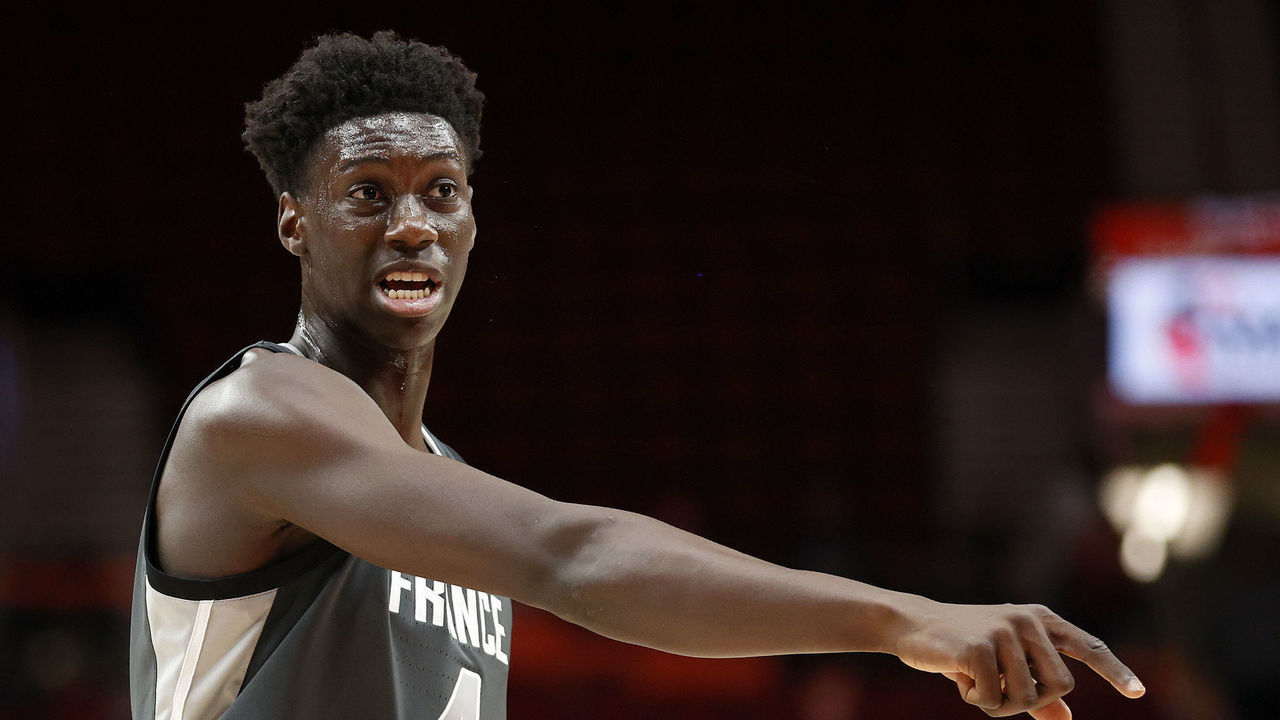PORTLAND, OREGON - APRIL 08: Sidy Cissoko #4 of World Team reacts against USA Team in the first quarter during the Nike Hoop Summit at Moda Center on April 08, 2022 in Portland, Oregon.