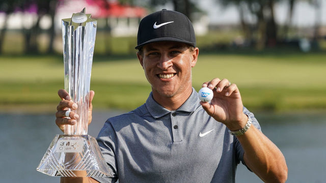 BLAINE, MN - JULY 25: Cameron Champ with the winning trophy, to win the 3M Open on July 25, 2021, at TPC Twin Cities in Blaine, Minnesota.