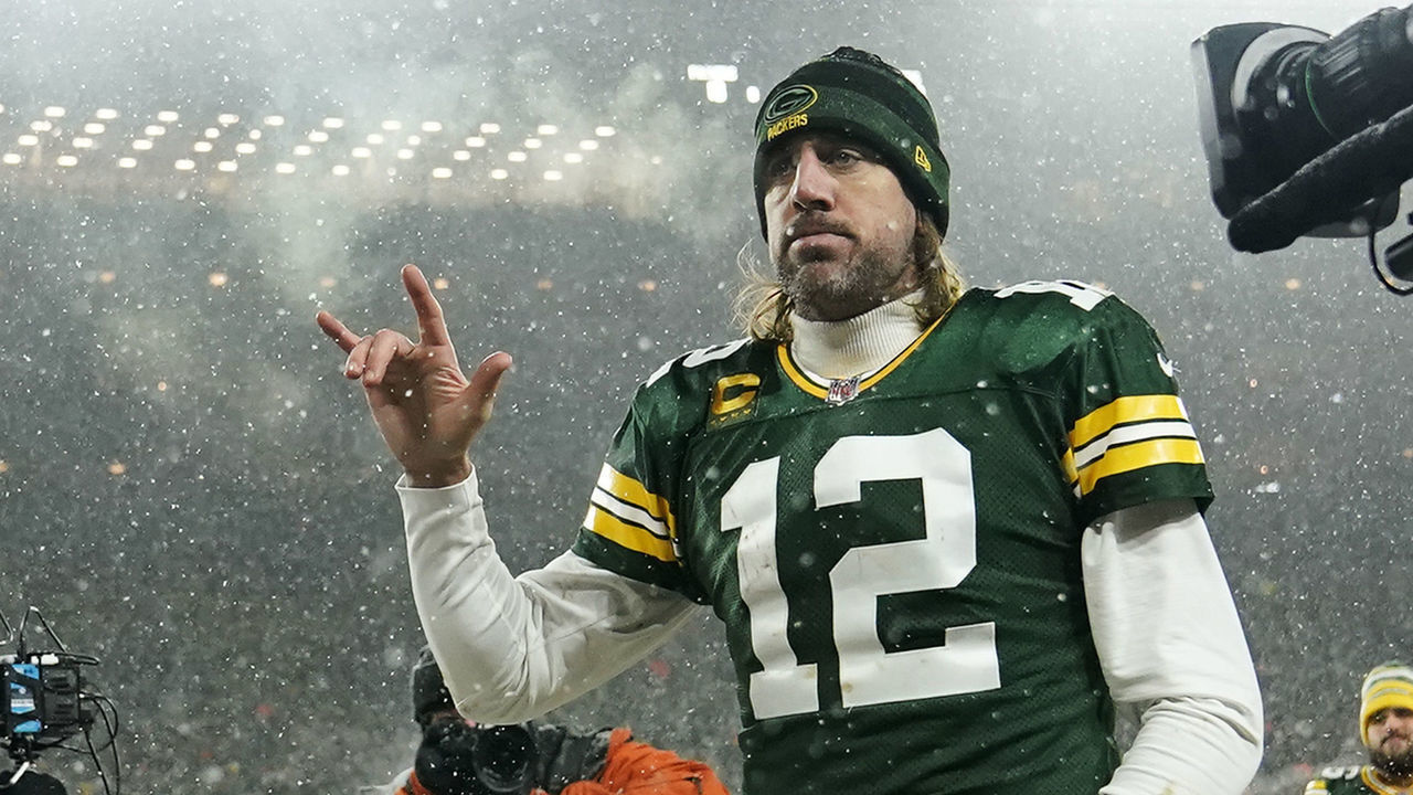 GREEN BAY, WISCONSIN - JANUARY 22: Quarterback Aaron Rodgers #12 of the Green Bay Packers gestures as he exits the field after losing the NFC Divisional Playoff game to the San Francisco 49ers at Lambeau Field on January 22, 2022 in Green Bay, Wisconsin.