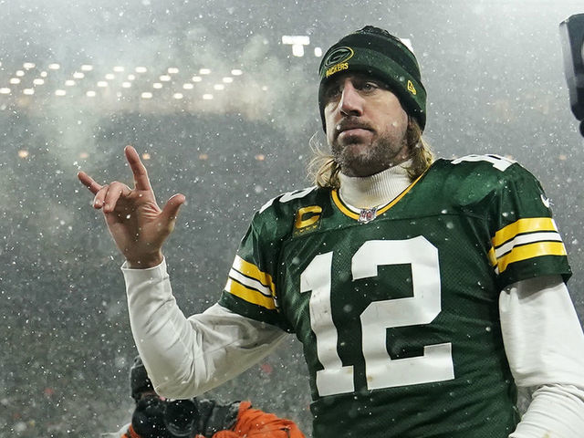 GREEN BAY, WISCONSIN - JANUARY 22: Quarterback Aaron Rodgers #12 of the Green Bay Packers gestures as he exits the field after losing the NFC Divisional Playoff game to the San Francisco 49ers at Lambeau Field on January 22, 2022 in Green Bay, Wisconsin.