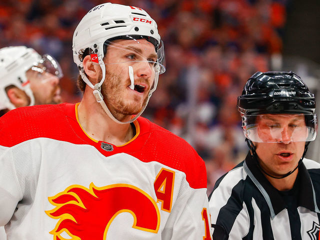 EDMONTON, AB - MAY 24: Calgary Flames Right Wing Matthew Tkachuk (19) gets pulled out of scrum action in the first period during the Edmonton Oilers versus the Calgary Flames in the Stanley Cup playoffs round 2, game 4 on May 24, 2022 at Rogers Place in Edmonton, AB.