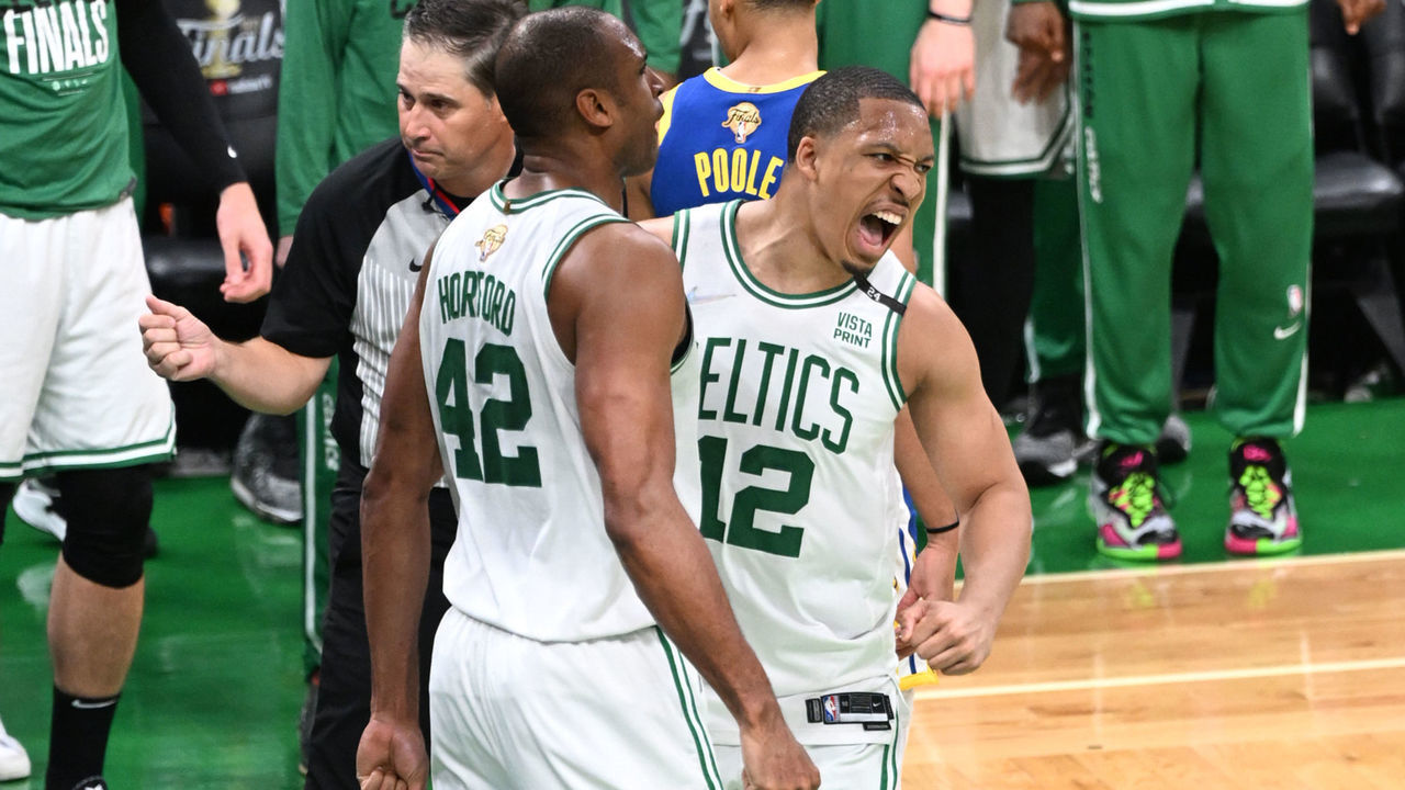 BOSTON, MA - JUNE 16: Grant Williams #12 celebrates with Al Horford #42 of the Boston Celtics during the game against the Golden State Warriors in Game Six of the 2022 NBA Finals on June 16, 2022 at the TD Garden in Boston, Massachusetts. Mandatory Copyright Notice: Copyright 2022 NBAE