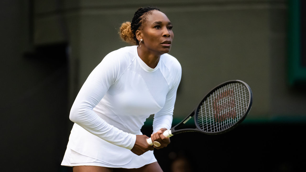 LONDON, ENGLAND - JULY 01: Venus Williams of the United States playing with partner Jamie Murray of Great Britain against Alicja Rosolska of Poland & Michael Venus of New Zealand in their first round mixed doubles match during Day Five of The Championships Wimbledon 2022 at All England Lawn Tennis and Croquet Club on July 01, 2022 in London, England