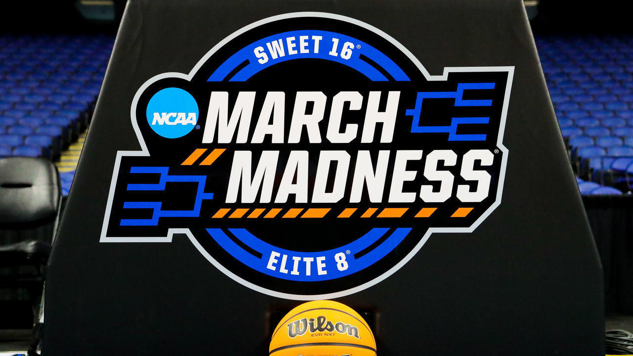 GREENSBORO, NC - MARCH 25: The March Madness logo is displayed on the back of the basket with the game ball during the NCAA Division I Womens Basketball Championship Sweet Sixteen round game between the South Carolina Gamecocks and the North Carolina Tar Heels on March 27, 2022, at Greensboro Coliseum in Greensboro, NC.