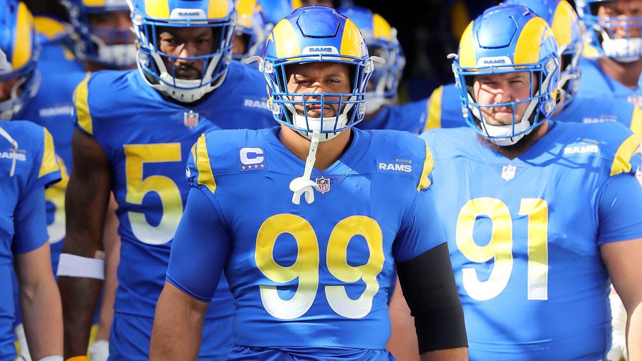 TAMPA, FL - JANUARY 23: Los Angeles Rams Defensive Lineman Aaron Donald (99) is set to lead the Rams onto the field before the NFC Divisional game between the Los Angeles Rams and the Tampa Bay Buccaneers on January 23, 2022 at Raymond James Stadium in Tampa, Florida.
