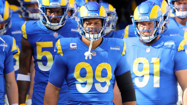 TAMPA, FL - JANUARY 23: Los Angeles Rams Defensive Lineman Aaron Donald (99) is set to lead the Rams onto the field before the NFC Divisional game between the Los Angeles Rams and the Tampa Bay Buccaneers on January 23, 2022 at Raymond James Stadium in Tampa, Florida.