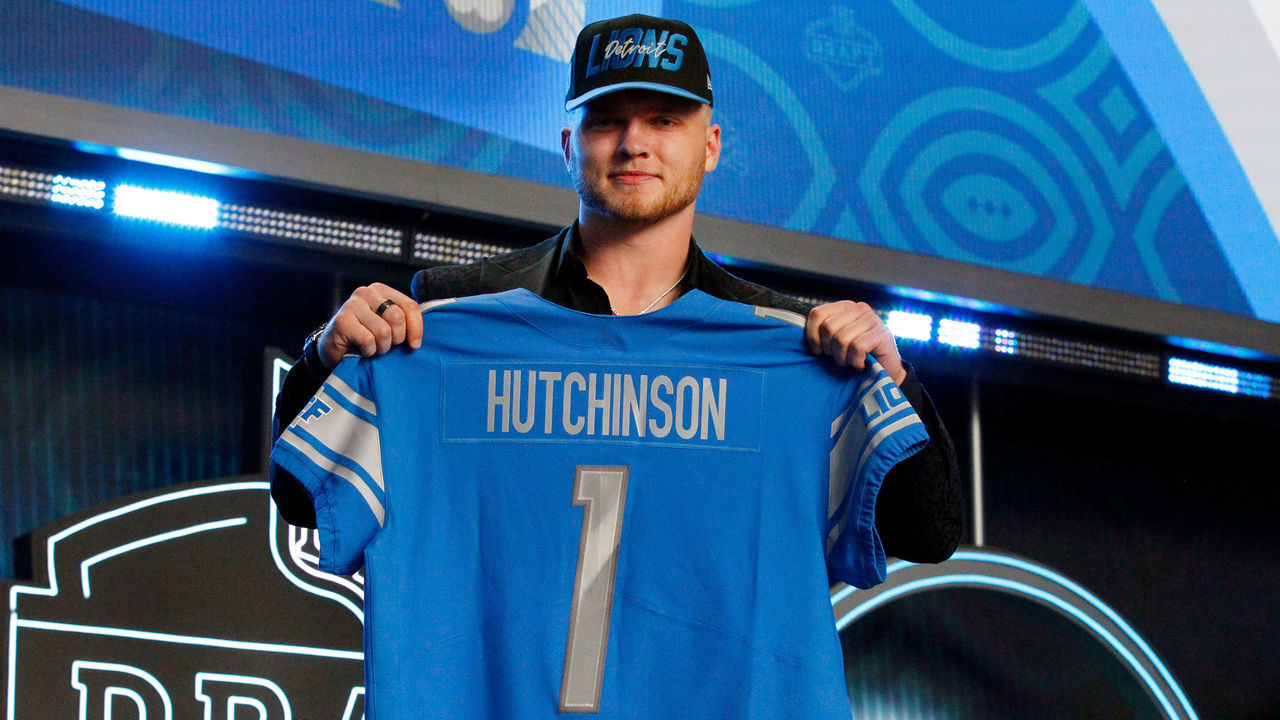 LAS VEGAS, NV - APRIL 28: Aidan Hutchinson, Michigan poses with his jersey as he is selected as the overall number two draft pick by the Detroit Lions during the NFL Draft on April 28, 2022 in Las Vegas, Nevada.