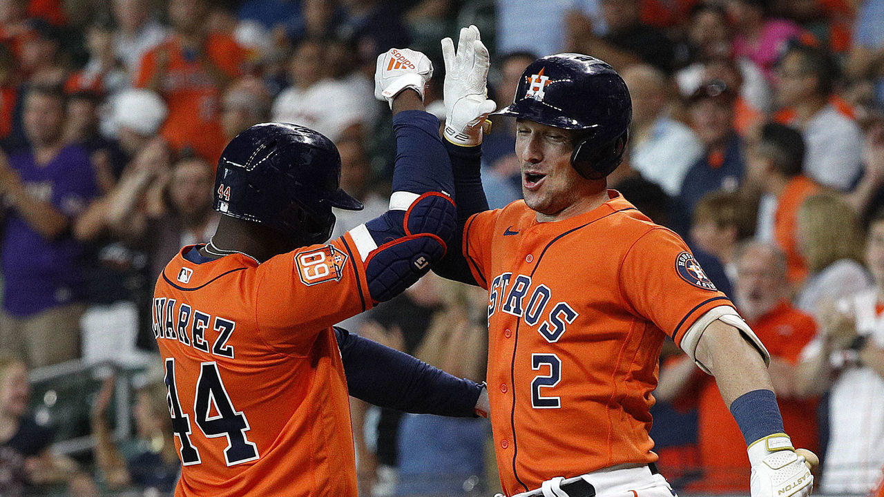 HOUSTON, TEXAS - JULY 21: Yordan Alvarez #44 of the Houston Astros celebrates his solo home run with Alex Bregman in the first inning during game two of a doubleheader at Minute Maid Park on July 21, 2022 in Houston, Texas.