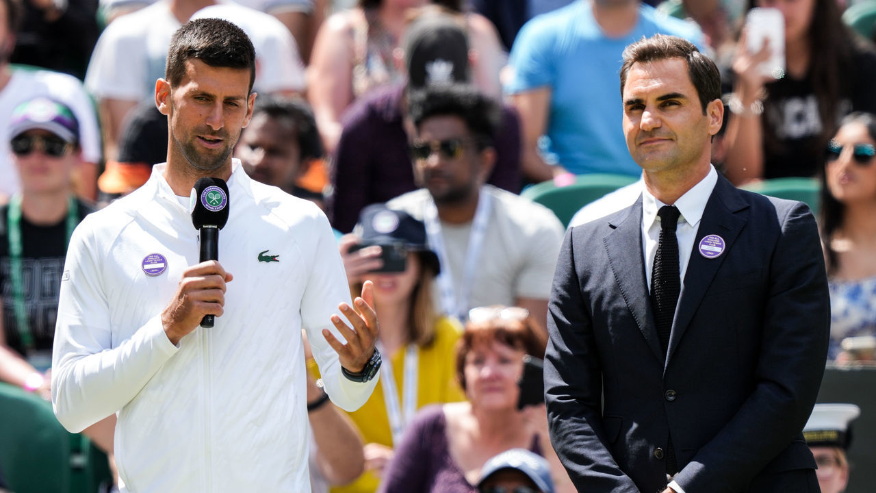 LONDON, ENGLAND - JULY 03: Novak Djokovic (L) of Serbia and Roger Federer of Switzerland attend the Centre Court Centenary Celebration during day seven of The Championships Wimbledon 2022 at All England Lawn Tennis and Croquet Club on July 03, 2022 in London, England.