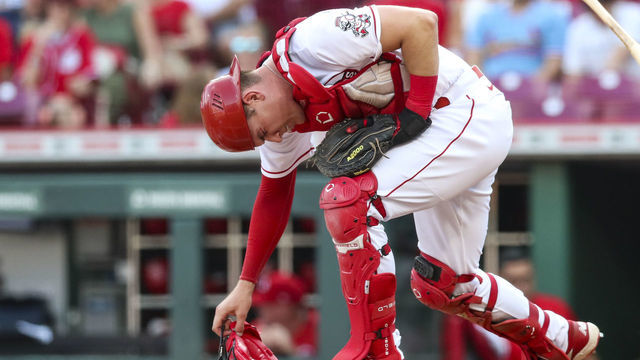 CINCINNATI, OH - JULY 22: Tyler Stephenson #37 of the Cincinnati Reds reacts after being hit in the arm by a pitch from Graham Ashcraft #51 of the Cincinnati Reds during the top of the first inning at Great American Ball Park on July 22, 2022 in Cincinnati, Ohio. Stephenson was pulled from the game for injury.