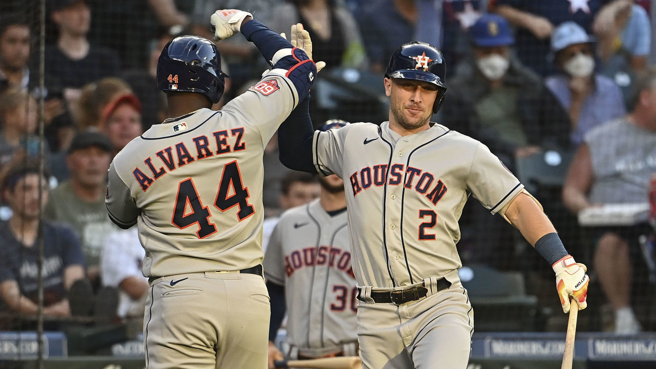 SEATTLE, WASHINGTON - JULY 22: Yordan Alvarez #44 of the Houston Astros celebrates with Alex Bregman #2 after hitting a solo home run during the fourth inning against the Seattle Mariners at T-Mobile Park on July 22, 2022 in Seattle, Washington.