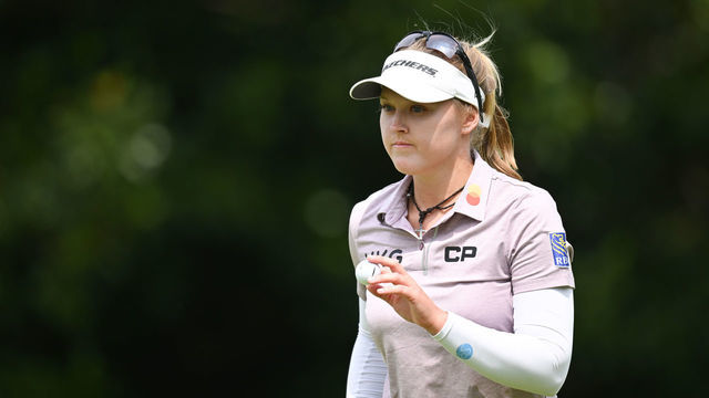 EVIAN-LES-BAINS, FRANCE - JULY 23: Brooke Henderson of Canada waves her golf ball on the ninth hole during day three of The Amundi Evian Championship at Evian Resort Golf Club on July 23, 2022 in Evian-les-Bains, France.