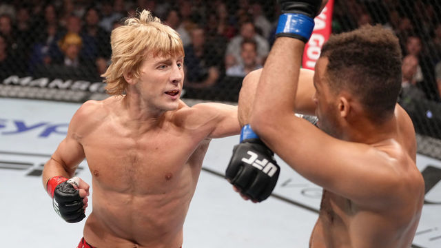 LONDON, ENGLAND - JULY 23: (L-R) Paddy Pimblett of England punches Jordan Leavitt in a lightweight fight during the UFC Fight Night event at O2 Arena on July 23, 2022 in London, England.