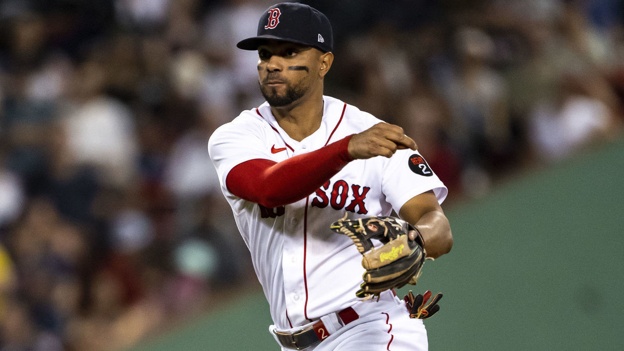 BOSTON, MA - JULY 6: Xander Bogaerts #2 of the Boston Red Sox throws during the sixth inning of a game against the Tampa Bay Rays on July 6, 2022 at Fenway Park in Boston, Massachusetts.