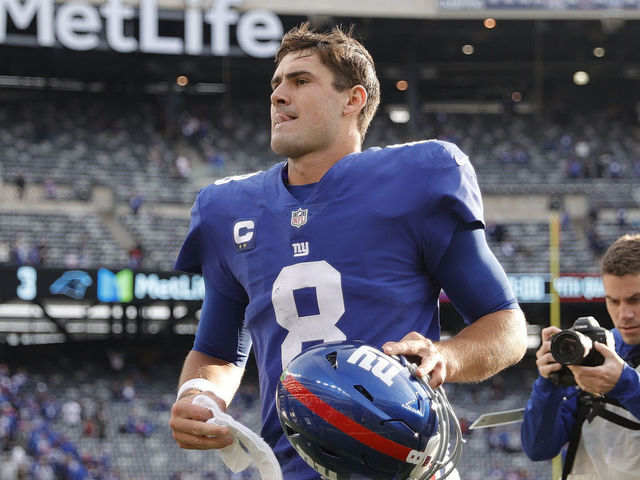 EAST RUTHERFORD, NEW JERSEY - OCTOBER 24: Daniel Jones #8 of the New York Giants reacts after a win against the Carolina Panthers at MetLife Stadium on October 24, 2021 in East Rutherford, New Jersey.
