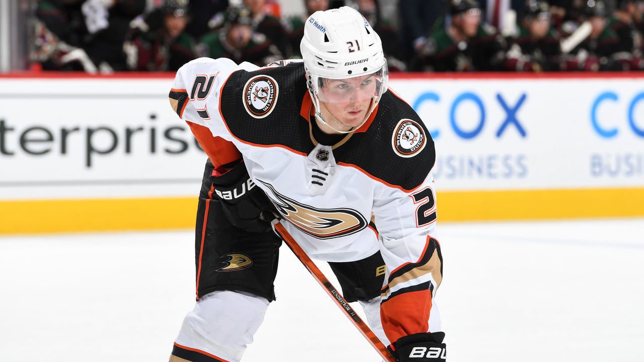 GLENDALE, ARIZONA - APRIL 01: Isac Lundestrom #21 of the Anaheim Ducks gets ready during a face off against the Arizona Coyotes at Gila River Arena on April 01, 2022 in Glendale, Arizona.
