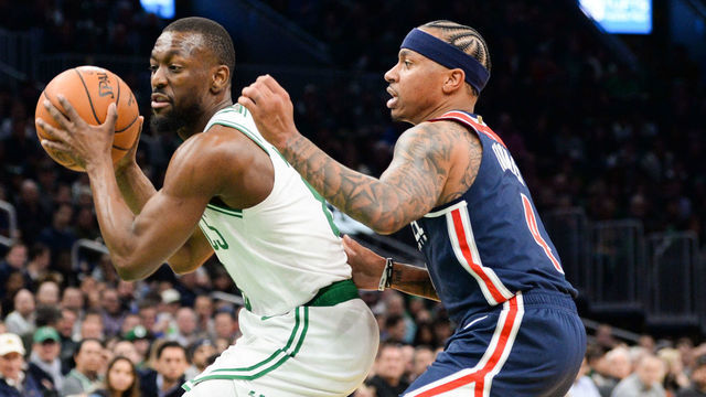 BOSTON, MA - NOVEMBER 13: Kemba Walker #8 of the Boston Celtics posts up against Isaiah Thomas #4 of the Washington Wizards in the second half at TD Garden on November 13, 2019 in Boston, Massachusetts.