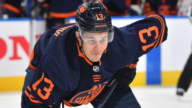 EDMONTON, AB - MAY 14: Jesse Puljujarvi #13 of the Edmonton Oilers lines up for a face off during Game Seven of the First Round of the 2022 Stanley Cup Playoffs against the Los Angeles Kings on May 14, 2022 at Rogers Place in Edmonton, Alberta, Canada.