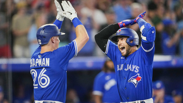 TORONTO, ON - JULY 26: George Springer #4 of the Toronto Blue Jays celebrates his grand slam with Matt Chapman #26 against the St. Louis Cardinals in the sixth inning during their MLB game at the Rogers Centre on July 26, 2022 in Toronto, Ontario, Canada.