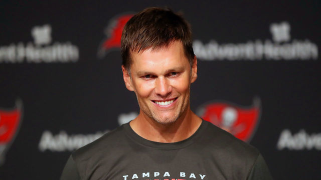 TAMPA, FL - JUN 09: Tampa Bay Buccaneers quarterback Tom Brady (12) speaks to the media after the Tampa Bay Buccaneers Minicamp on June 09, 2022 at the AdventHealth Training Center at One Buccaneer Place in Tampa, Florida.