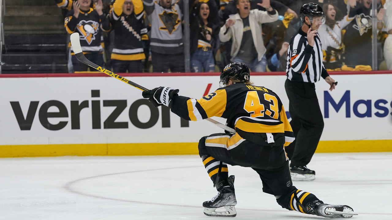 PITTSBURGH, PA - MAY 07: Pittsburgh Penguins left wing Danton Heinen (43) celebrates after scoring the game-winning goal during the third period in Game Three of the First Round in the 2022 NHL Stanley Cup Playoffs between the New York Rangers and the Pittsburgh Penguins on May 7, 2022, at PPG Paints Arena in Pittsburgh, PA.