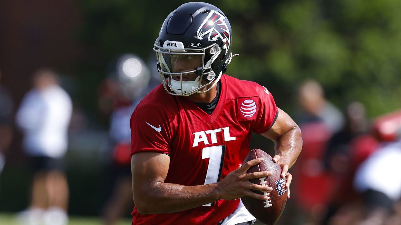 FLOWERY BRANCH, GA - JULY 27: Marcus Mariota #1 of Atlanta Falcons rolls out during a training camp practice on July 27, 2022 in Flowery Branch, Georgia.